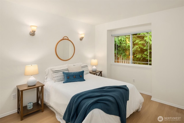 3816 NE 110th St, Seattle, WA 98125 - bedroom with wood finished floors and baseboards