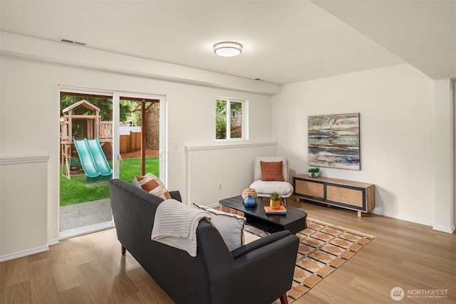 3816 NE 110th St, Seattle, WA 98125 - living area with healthy amount of natural light and wood finished floors