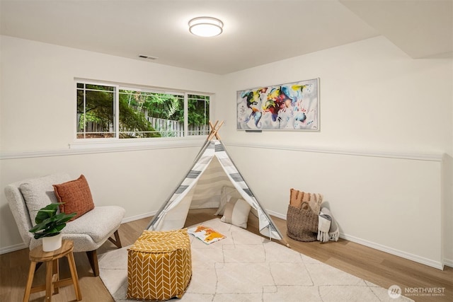 3816 NE 110th St, Seattle, WA 98125 - playroom featuring wood finished floors and baseboards