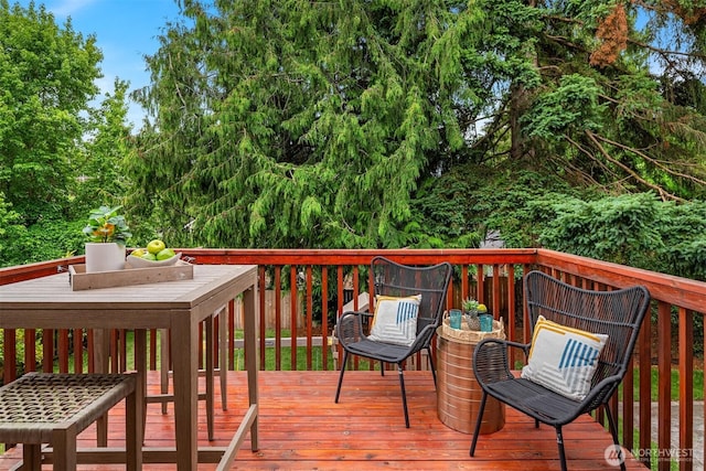 3816 NE 110th St, Seattle, WA 98125 - wooden deck featuring view of wooded area