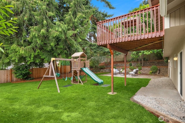 3816 NE 110th St, Seattle, WA 98125 - fenced backyard with a playground, a deck, and a patio area