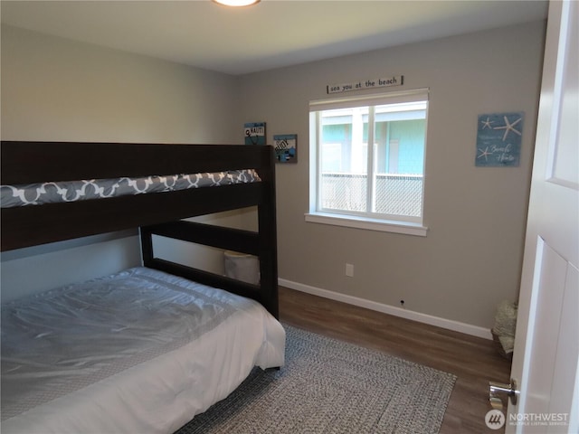 417 Riviera St SW, Ocean Shores, WA 98569 - bedroom featuring wood finished floors and baseboards