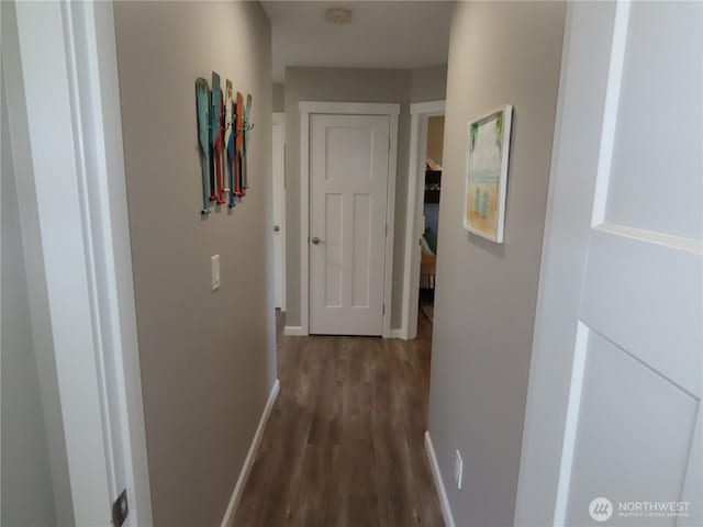 417 Riviera St SW, Ocean Shores, WA 98569 - hallway with dark wood-style flooring and baseboards