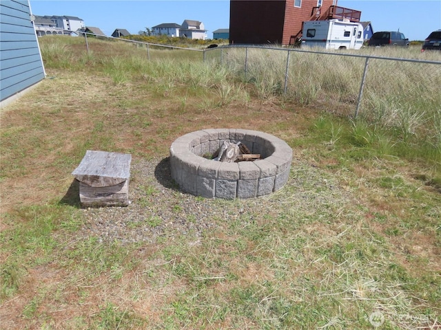 417 Riviera St SW, Ocean Shores, WA 98569 - view of yard with a fire pit