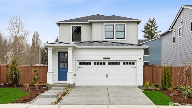 13473 NE 105th Ct Unit 12, Kirkland, WA 98033 - view of front of property with driveway, a standing seam roof, roof with shingles, an attached garage, and board and batten siding