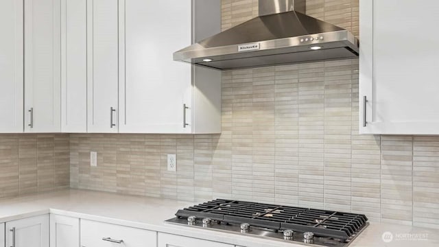 13473 NE 105th Ct Unit 12, Kirkland, WA 98033 - kitchen featuring wall chimney exhaust hood, stainless steel gas stovetop, white cabinetry, and light countertops