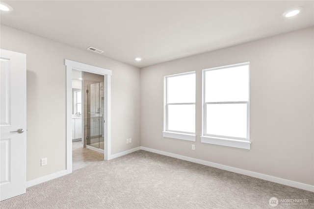 13473 NE 105th Ct Unit 12, Kirkland, WA 98033 - unfurnished bedroom with light carpet, baseboards, recessed lighting, and ensuite bathroom