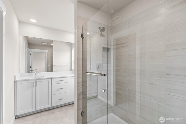 13473 NE 105th Ct Unit 12, Kirkland, WA 98033 - bathroom with a stall shower, vanity, and recessed lighting