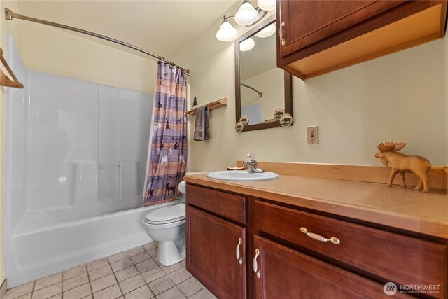 11 Appaloosa Rd, Winthrop, WA 98862 - full bathroom featuring toilet, tile patterned floors, shower / bath combination with curtain, and vanity
