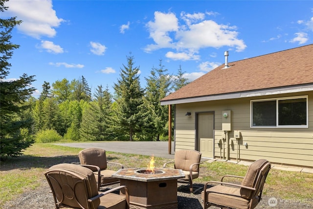 1751 Stone Ridge Dr, Cle Elum, WA 98922 - view of patio featuring an outdoor fire pit