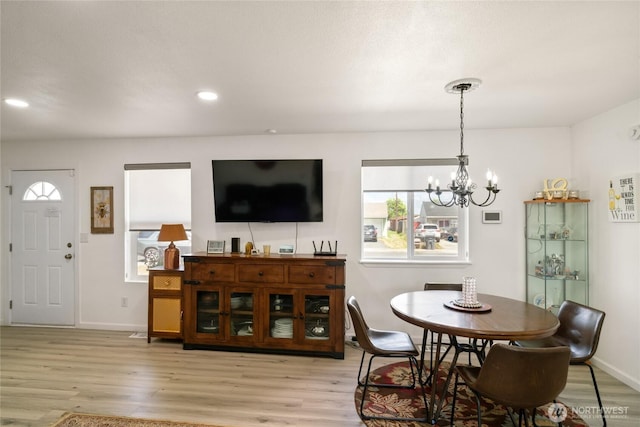 1123 Mather Dr, Moses Lake, WA 98837 - dining space featuring a chandelier, baseboards, light wood-type flooring, and recessed lighting