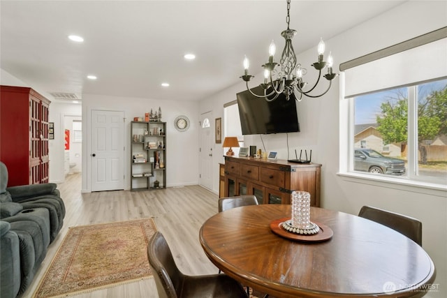 1123 Mather Dr, Moses Lake, WA 98837 - dining space featuring light wood-type flooring, a chandelier, recessed lighting, and baseboards
