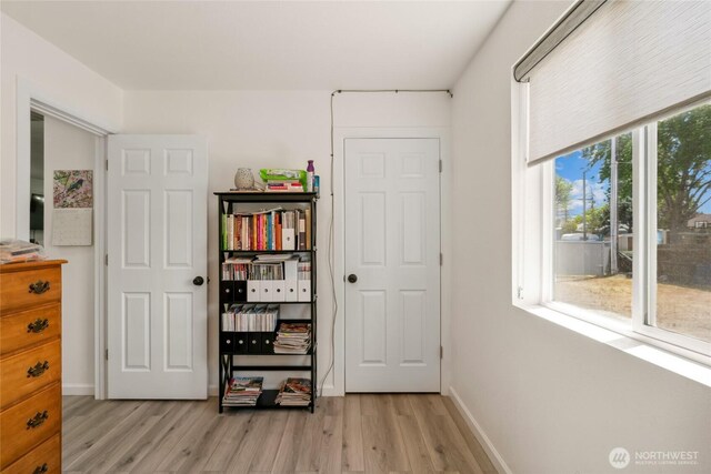 1123 Mather Dr, Moses Lake, WA 98837 - bedroom featuring light wood-style flooring and baseboards