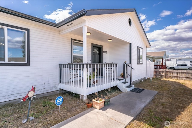 1123 Mather Dr, Moses Lake, WA 98837 - doorway to property featuring covered porch