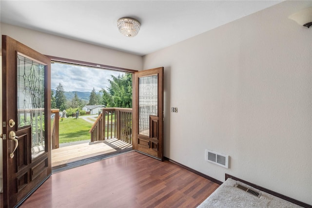 21410 161st Ave E, Graham, WA 98338 - foyer featuring wood finished floors, baseboards, and a mountain view