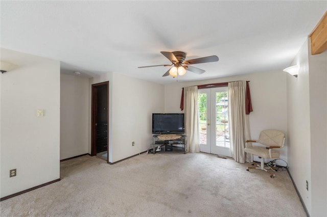 21410 161st Ave E, Graham, WA 98338 - living area featuring light colored carpet, ceiling fan, and baseboards