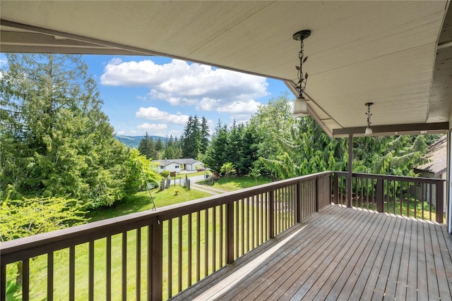21410 161st Ave E, Graham, WA 98338 - wooden deck with a yard and view of wooded area