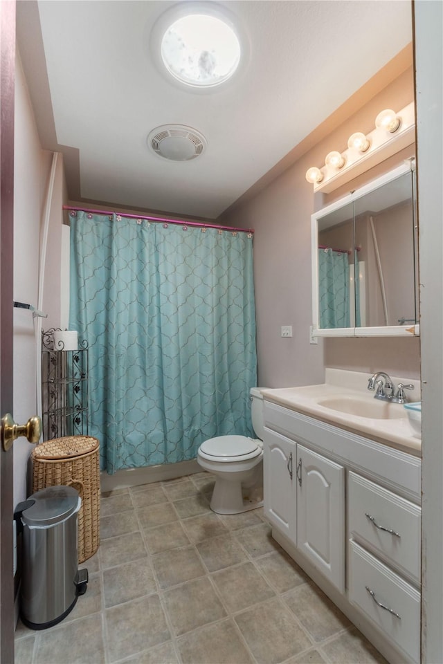 21410 161st Ave E, Graham, WA 98338 - bathroom with vanity, toilet, and a shower with curtain