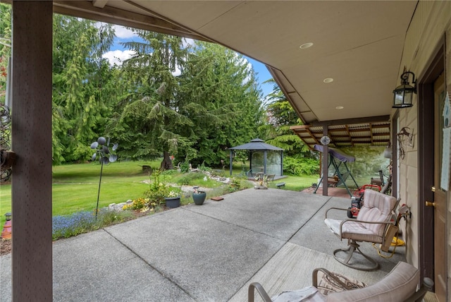 21410 161st Ave E, Graham, WA 98338 - view of patio / terrace with a gazebo and view of wooded area