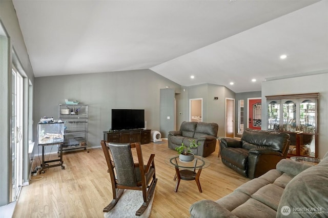 17943 Clear Lake Blvd SE, Yelm, WA 98597 - living room with lofted ceiling, light wood finished floors, and recessed lighting
