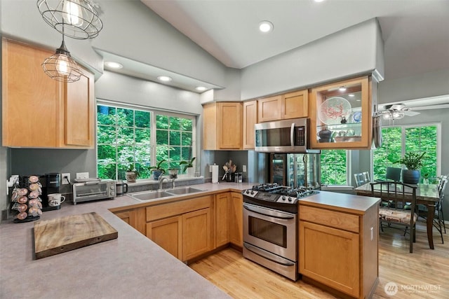 17943 Clear Lake Blvd SE, Yelm, WA 98597 - kitchen with appliances with stainless steel finishes, a sink, light countertops, and recessed lighting