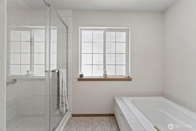 17943 Clear Lake Blvd SE, Yelm, WA 98597 - bathroom featuring a garden tub, a stall shower, baseboards, and tile patterned flooring