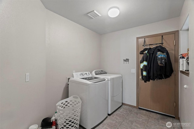17943 Clear Lake Blvd SE, Yelm, WA 98597 - laundry room with washing machine and clothes dryer and baseboards