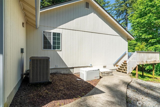 17943 Clear Lake Blvd SE, Yelm, WA 98597 - view of property exterior featuring central AC, a deck, and stairway