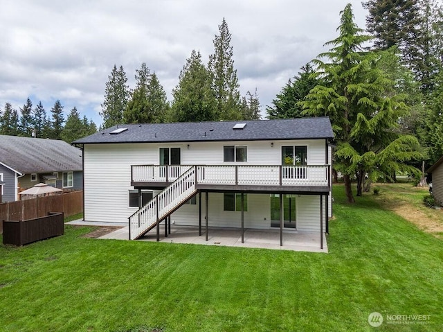 8302 319th St NW, Stanwood, WA 98292 - back of house with a patio area, a wooden deck, and stairs