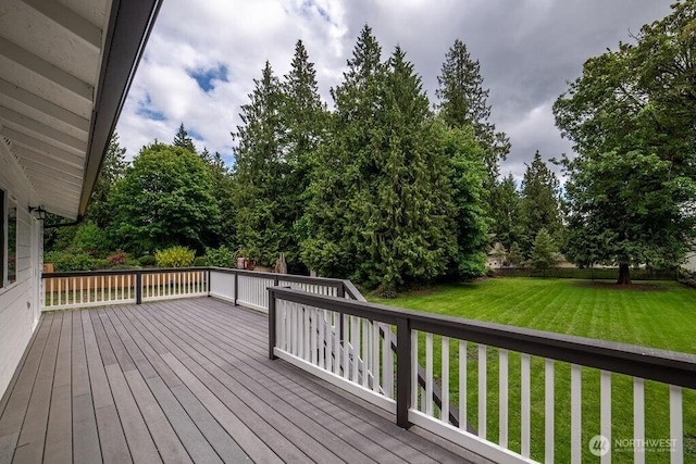 8302 319th St NW, Stanwood, WA 98292 - deck featuring a yard and view of wooded area