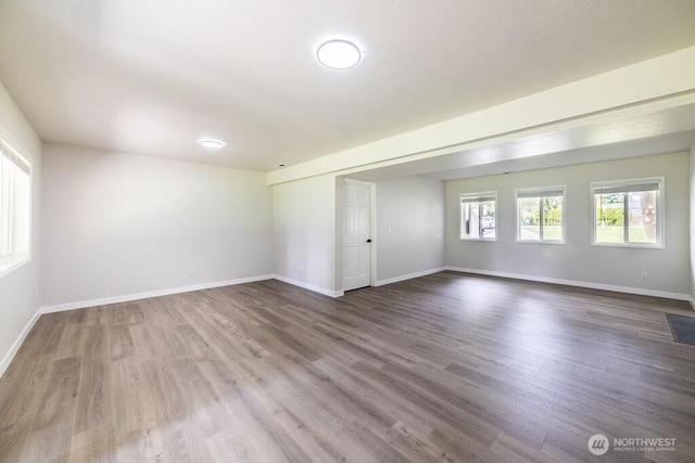 8302 319th St NW, Stanwood, WA 98292 - unfurnished room with wood finished floors and baseboards