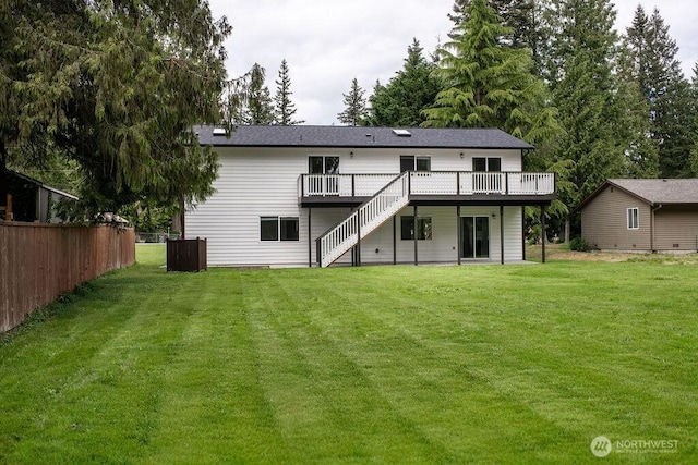 8302 319th St NW, Stanwood, WA 98292 - rear view of property featuring a wooden deck and stairs