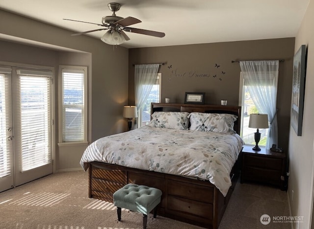 1809 Briarwood Pl, Wenatchee, WA 98802 - carpeted bedroom featuring multiple windows, baseboards, a ceiling fan, and access to exterior