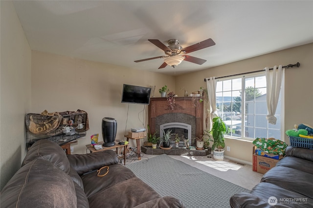 1722 Lincoln Park Cir, Wenatchee, WA 98801 - living area with a ceiling fan, a fireplace with raised hearth, baseboards, and carpet floors