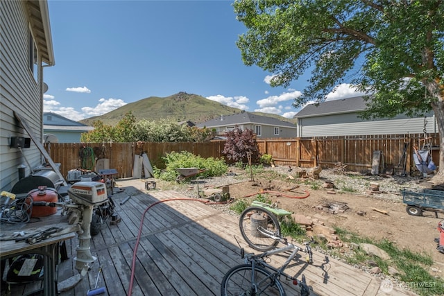 1722 Lincoln Park Cir, Wenatchee, WA 98801 - wooden deck with a mountain view and a fenced backyard