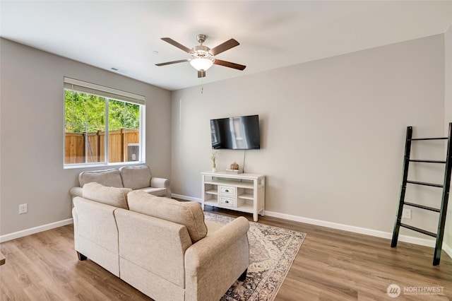 8605 E Gilman Ave, Arlington, WA 98223 - living room featuring a ceiling fan and wood finished floors
