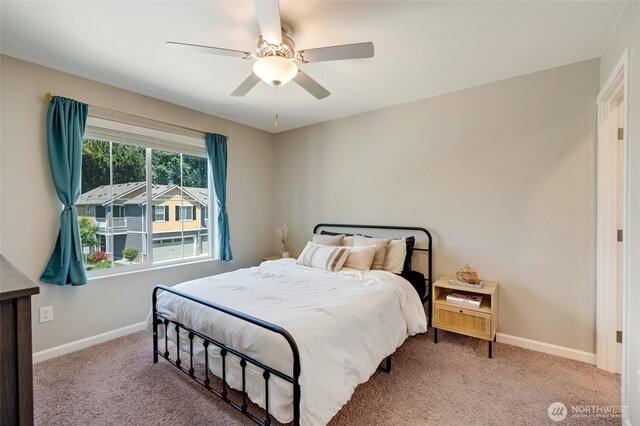8605 E Gilman Ave, Arlington, WA 98223 - carpeted bedroom featuring baseboards and a ceiling fan