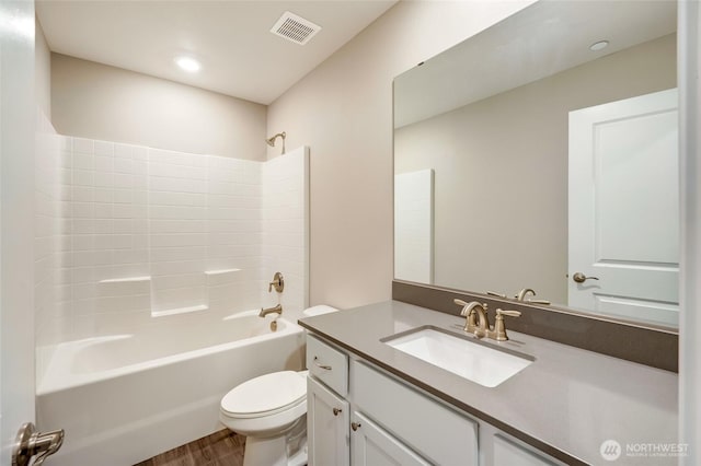 8605 E Gilman Ave, Arlington, WA 98223 - full bathroom featuring vanity, wood finished floors, bathing tub / shower combination, and recessed lighting
