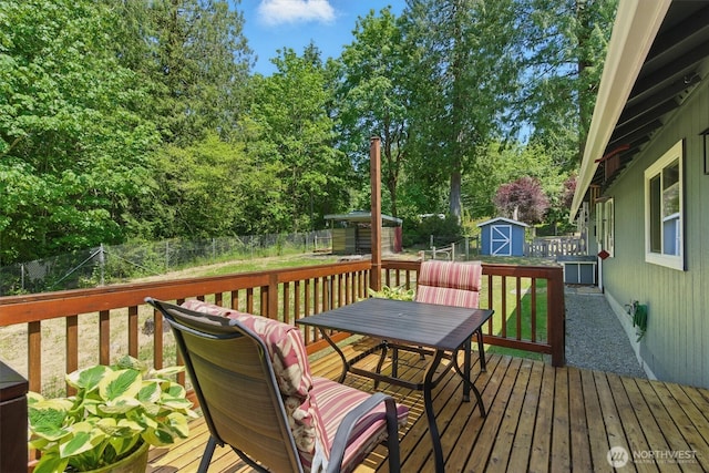 9264 Horizon Ln SE, Port Orchard, WA 98367 - deck featuring outdoor dining area and view of scattered trees