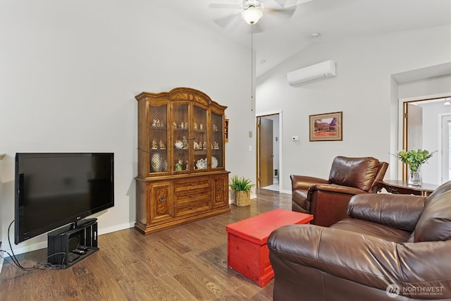 9264 Horizon Ln SE, Port Orchard, WA 98367 - living room featuring an AC wall unit, a ceiling fan, wood finished floors, high vaulted ceiling, and baseboards