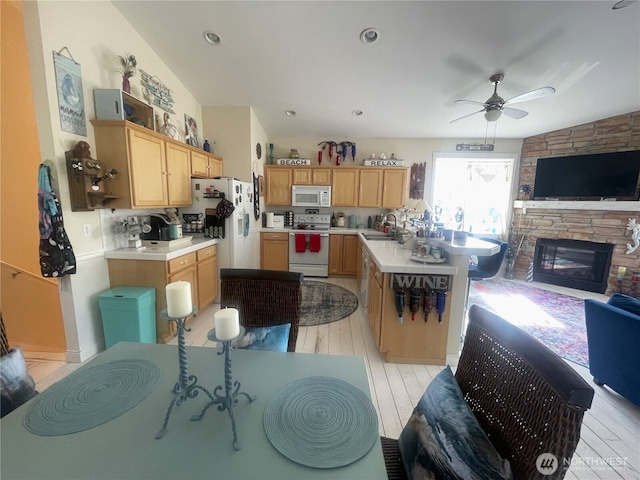 208 Taurus Blvd SW, Ocean Shores, WA 98569 - kitchen featuring white appliances, open floor plan, ceiling fan, a sink, and recessed lighting