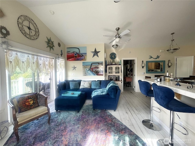 208 Taurus Blvd SW, Ocean Shores, WA 98569 - living area featuring vaulted ceiling, ceiling fan, and light wood-style floors