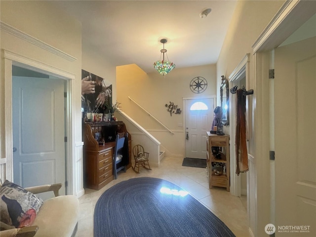 208 Taurus Blvd SW, Ocean Shores, WA 98569 - foyer featuring light tile patterned flooring and stairway