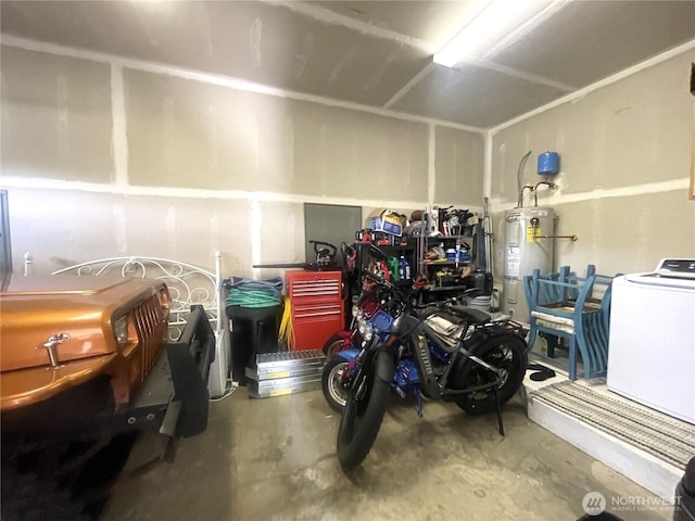 208 Taurus Blvd SW, Ocean Shores, WA 98569 - garage with washer / clothes dryer and water heater
