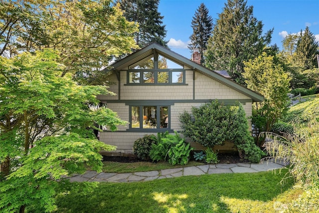 14830 Glen Acres Rd SW, Vashon, WA 98070 - view of home's exterior featuring a chimney and a yard