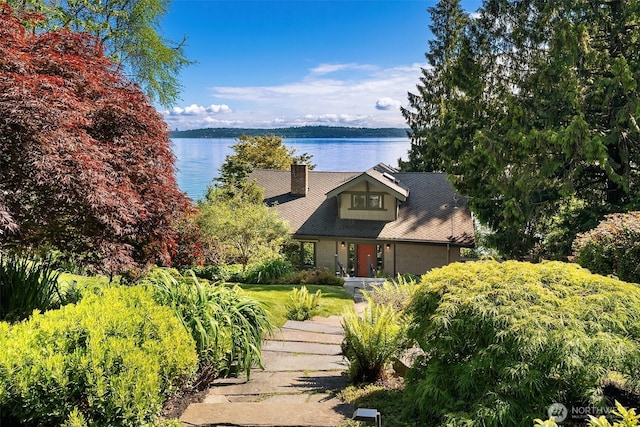 14830 Glen Acres Rd SW, Vashon, WA 98070 - view of front facade with a water view and a chimney