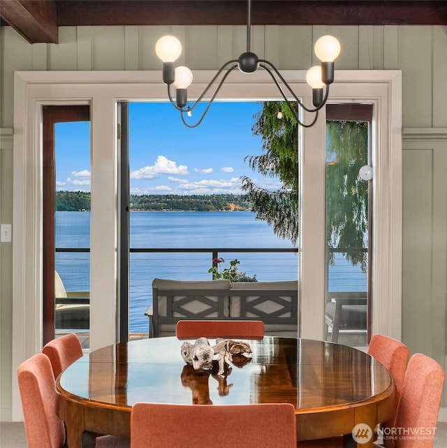 14830 Glen Acres Rd SW, Vashon, WA 98070 - dining area with a water view, healthy amount of natural light, and a chandelier