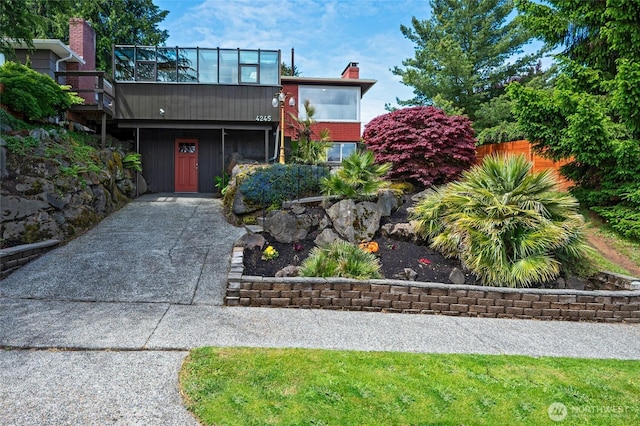 4245 Williams Ave W, Seattle, WA 98199 - view of front of home with a chimney