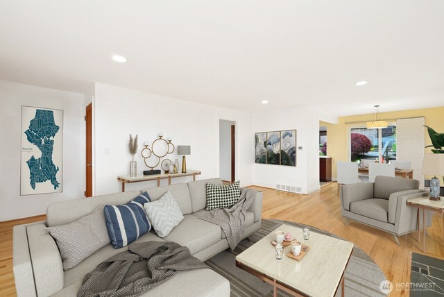 4245 Williams Ave W, Seattle, WA 98199 - living area featuring light wood finished floors and recessed lighting