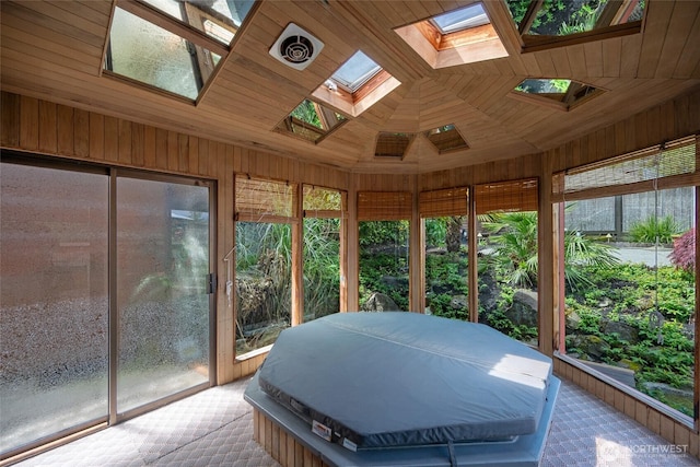 4245 Williams Ave W, Seattle, WA 98199 - sunroom featuring a skylight, plenty of natural light, and lofted ceiling